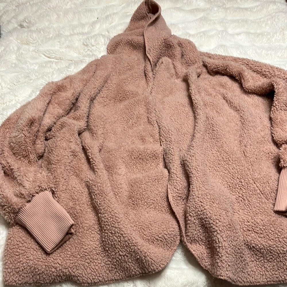 Very cozy jacket with pockets and hood bought from local boutique